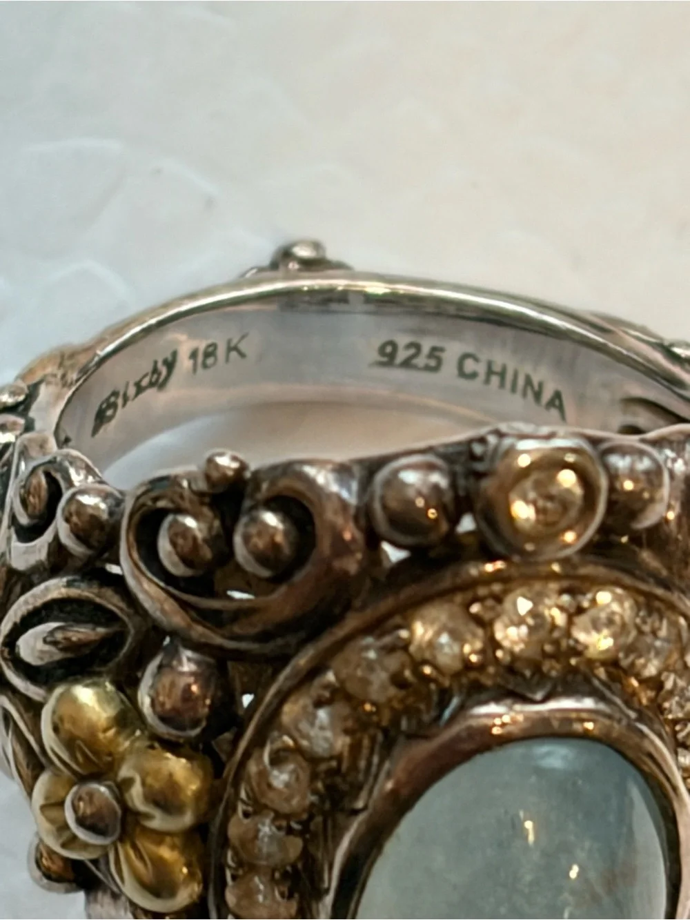 Barbara Bixby sterling and 18k yellow gold sky blue and white topaz ring.
